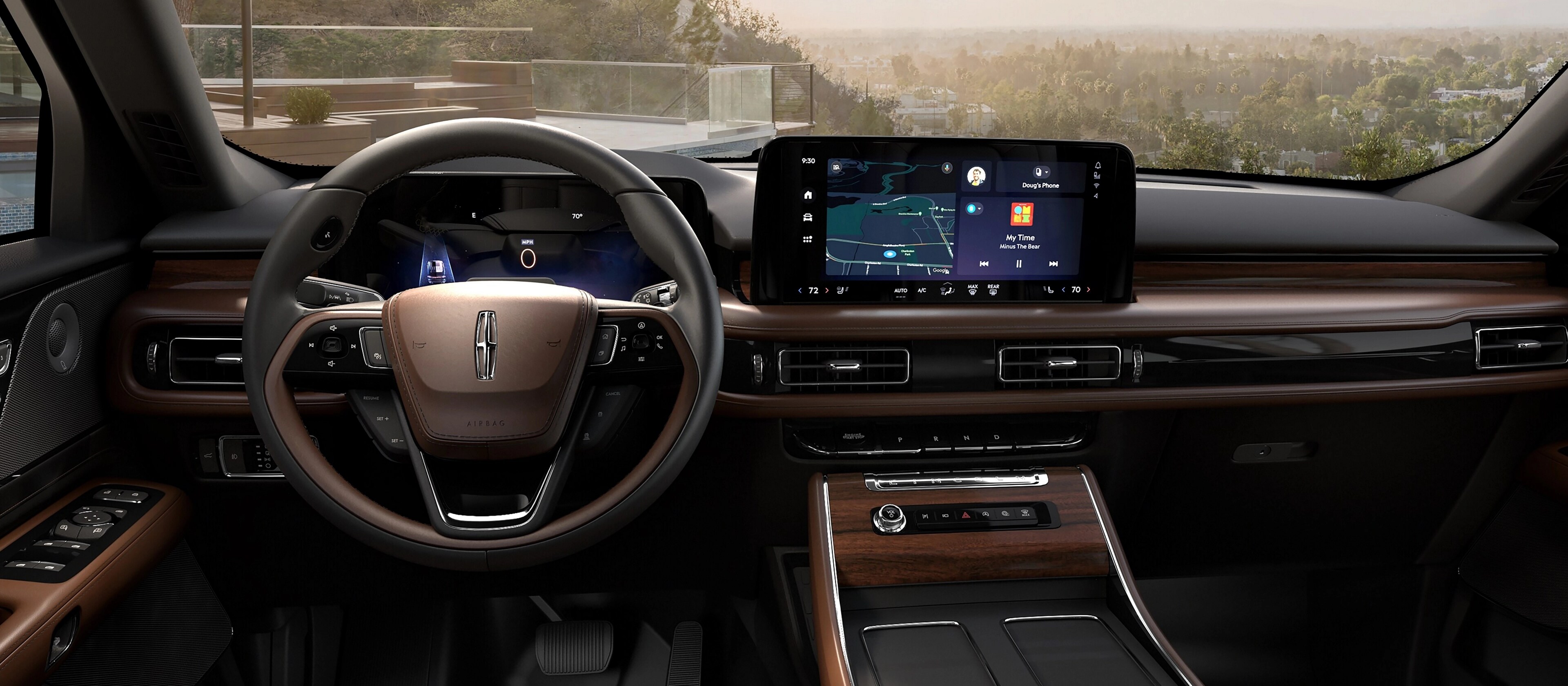 Vue intérieure de la deuxième rangée d’un Lincoln Aviator® 2026, en regardant à travers le pare-brise