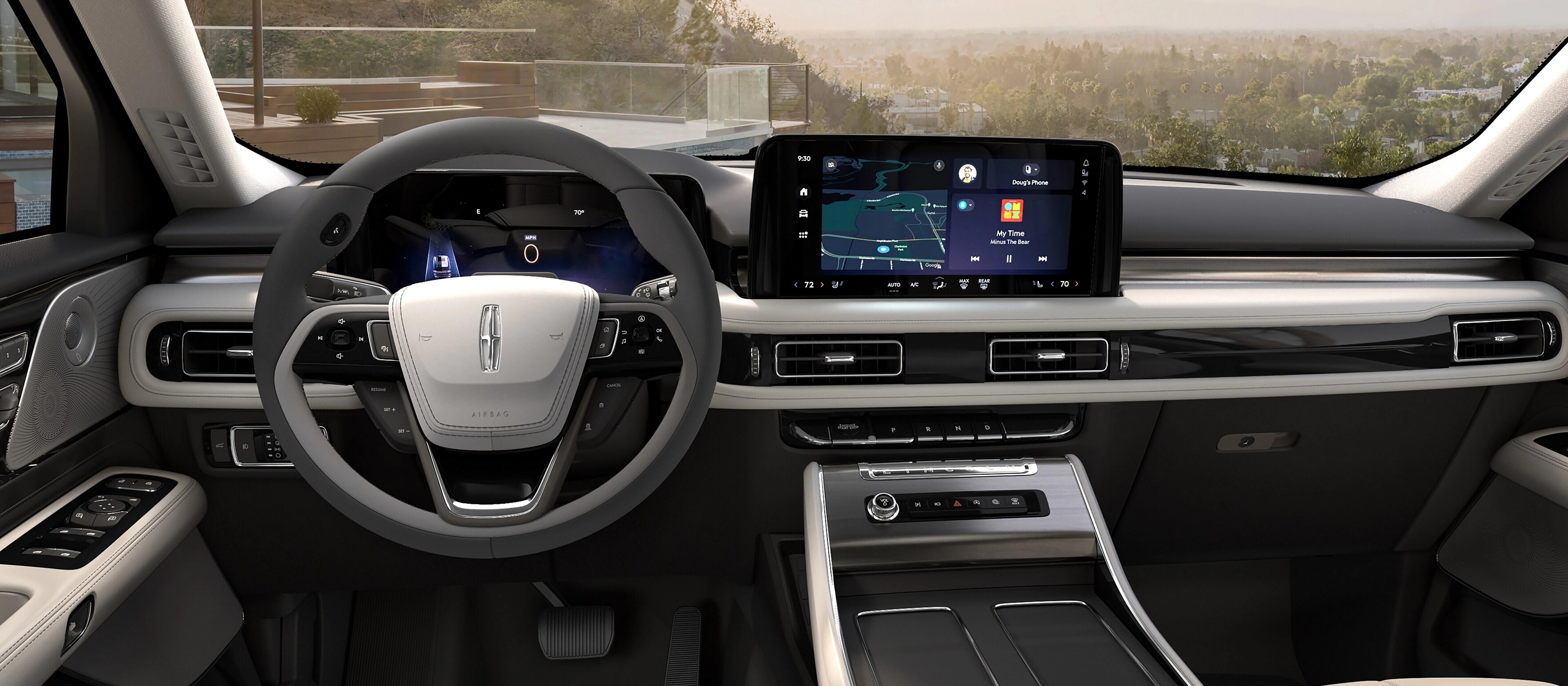 Vue intérieure de la deuxième rangée d’un Lincoln Aviator® 2026, en regardant à travers le pare-brise